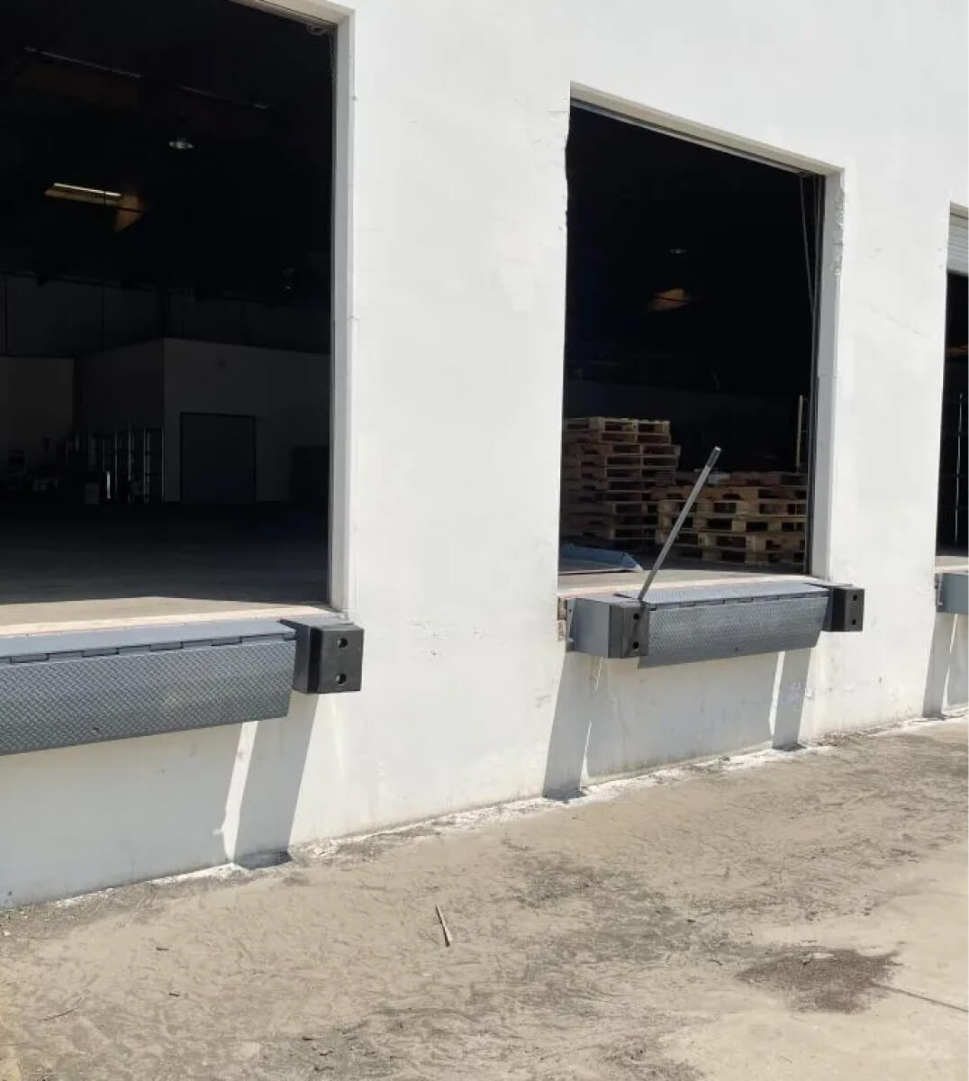 Loading dock doors at a Fibercore warehouse facility